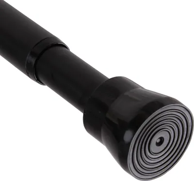 Close-up of the end of a black adjustable tension rod.