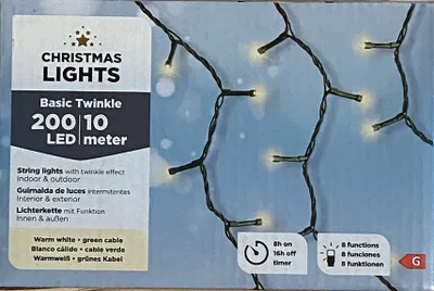 The image shows the packaging of Christmas lights, with a portion of the lights themselves visible.