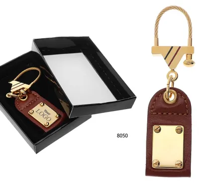 Produktbild von MPM-Quality Schlüsselanhänger Qadir vergoldet, mit Schraubverschluss Gold/Braun