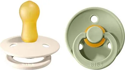 Two pacifiers are shown against a white background.
