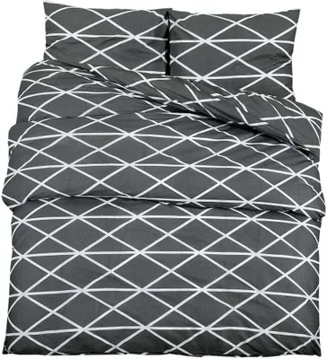 A neatly folded grey bedding set with a white geometric pattern, displayed on a white background.