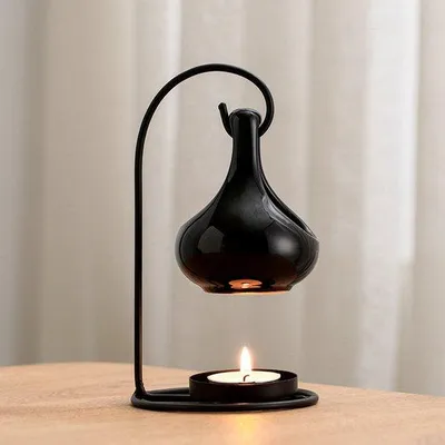 Produktbild von Hängebarer Metallgeurbrander, schwarz, für Aromatherapie und Raumduft.