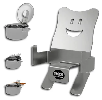 Produktbild von Deckelhalter aus Edelstahl für Töpfe und Pfannen – platzsparend mit Smiley-Design – Überkochschutz und Ablage für Kochlöffel – spülmaschinenfest, rostfrei und hygienisch