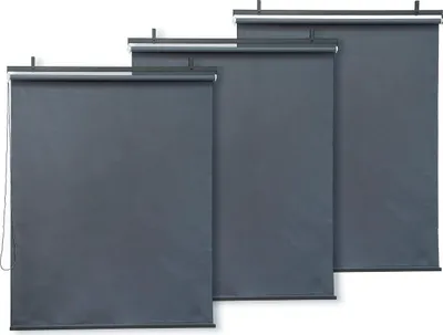 Three dark gray roller blinds are displayed side-by-side, with the leftmost blind being the widest and the rightmost being the narrowest.