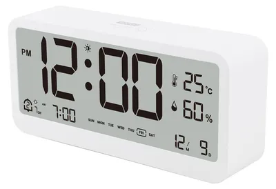 A white digital alarm clock displaying the time, date, temperature, and humidity.