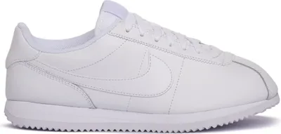 A white Nike Cortez sneaker shown from the side.