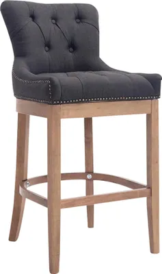 A single upholstered bar stool with a tufted back and nailhead trim is shown against a white background.