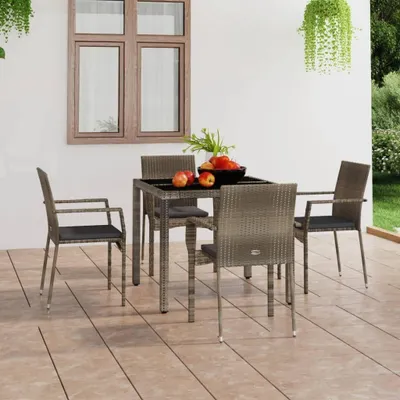 Produktbild von 4er-Set Gartenstühle aus grauem Poly-Rattan mit Kissen | Pulverbeschichteter Stahlrahmen, bis 110 kg belastbar, wetterbeständig und pflegeleicht