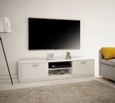 A white TV stand with a television mounted above it in a living room setting.