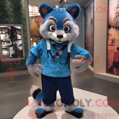 Immagine prodotto di Personaggio mascotte REDBROKOLY di un procione blu vestito con pantaloni da jogging e papillon
