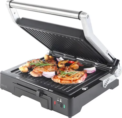 An open electric grill with food cooking on it.