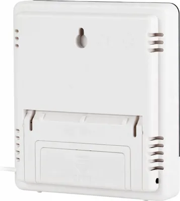 The back of a white digital weather station is shown, with a battery compartment and a hanging slot.