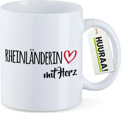 Produktbild von Huuraa Kaffeetasse Rheinländerin mit Herz 330ml Weiß Keramik Kaffeebecher Geschenkidee