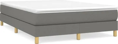 A dark gray bed frame with a white mattress topper and wooden legs, shown on a white background.