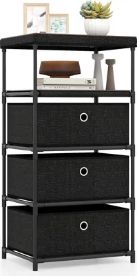 A black fabric storage unit with three drawers and a wooden top shelf, decorated with a few items.