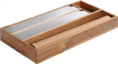 A wooden drawer organizer with two compartments holding rolled items and flat metallic sheets.