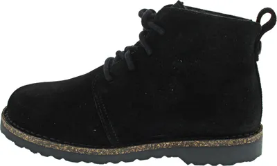 Side view of a black suede boot.