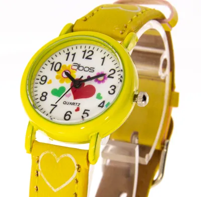 A close-up shot of a children's watch with a yellow strap and a colorful dial.