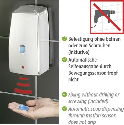 A soap dispenser is shown mounted on a tiled wall, with a hand receiving soap from it.