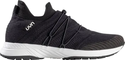 A side view of a black UYN slip-on sneaker with a white sole.