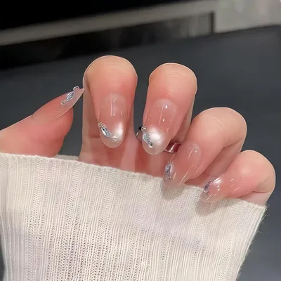 Immagine prodotto di Unghie finte effetto "cat eye", ovali, color rosa acceso, con strass, confezione da 30 pezzi