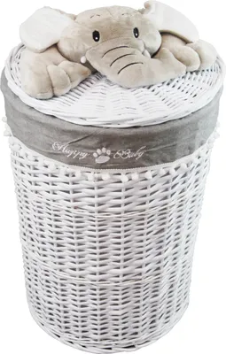 A white wicker laundry basket with a grey fabric liner and a plush elephant toy on the lid.