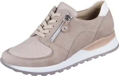 A single beige sneaker is shown against a white background.