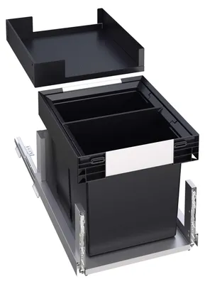 A disassembled kitchen bin system with a sliding mechanism and two compartments.
