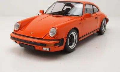 Produktbild von Minichamps 1:18 PORSCHE 911 CARRERA COUPE 3.2 - 1983 - ORANGE