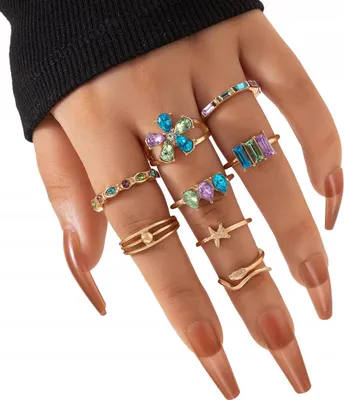 Imagen del producto de Conjunto de 8 anillos vintage de estilo retro-punk, con flores de diferentes colores