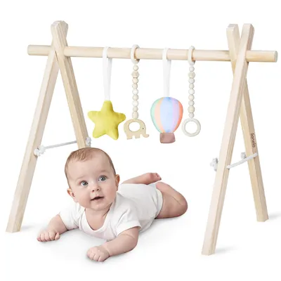 Produktbild von Lionelo Anis Baby-Gym aus Holz, klappbar, Montessori Spielbogen ab Geburt (0+), mit 4 Spielzeugen