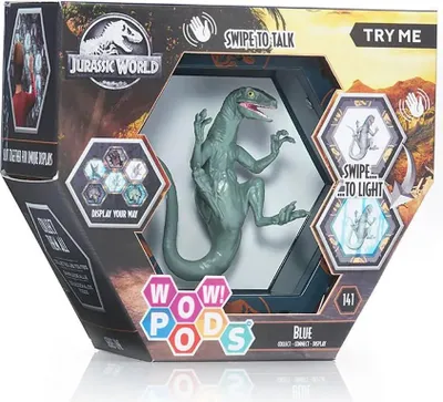 The image shows the packaging of a Jurassic World toy, featuring a blue raptor figure inside a hexagonal display window. The packaging has promotional text and graphics.