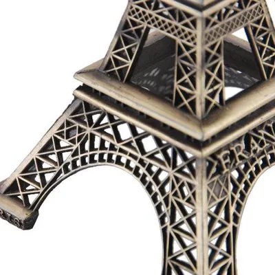 Produktbild von Unyqoos® Eiffelturm Deko 15 cm – Eisen, bronzefarben, handgearbeitetes Architektur-Modell als Tischdeko & Geschenk für Paris-Liebhaber