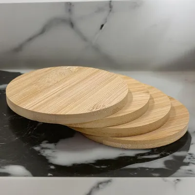 Produktbild von 4er-Set Untersetzer aus Holz für Gläser und Tassen, Ø 11 cm – Untersetzer für Getränke – Untersetzer für Tee – in .