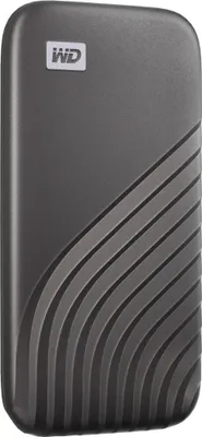 A dark gray external hard drive with a textured pattern on the lower right side and a white WD logo in the upper left corner.