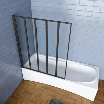A bathtub with a folding shower screen installed.