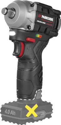 A cordless impact wrench with a battery pack is shown against a white background. A yellow 'X' symbol is overlaid on the battery pack.