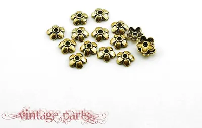 Produktbild von Vintageparts 30 florale Perlkappen antik goldfarben, 6,5 mm