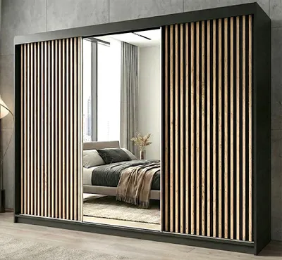 A bedroom scene with a wardrobe in the foreground.