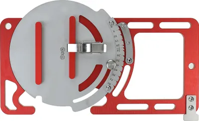 A close-up, top-down view of a red and silver woodworking tool, likely a guide or jig, against a white background.