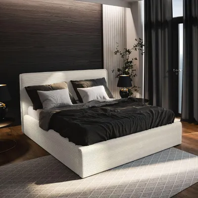 A bedroom scene with a bed, nightstands, and curtains.