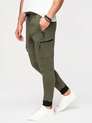 Imagen del producto de Pantalón de chándal para hombre, modelo OM-PASK-0222, color verde, talla S, con cintura ajustable y detalles modernos