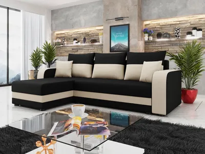 A modern living room with a sectional sofa, coffee table, and decorative elements.