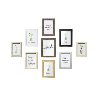 A collection of nine picture frames of various sizes and colors arranged on a white background.
