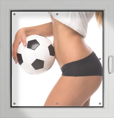 Produktbild von Wallario Lichtschutzbild, Dekorativer Sichtschutz Sonnenschutz 96 x 100 cm mit Motiv: Fußball - sexy Frau mit einem Fußball - Verdunklung ohne Bohren