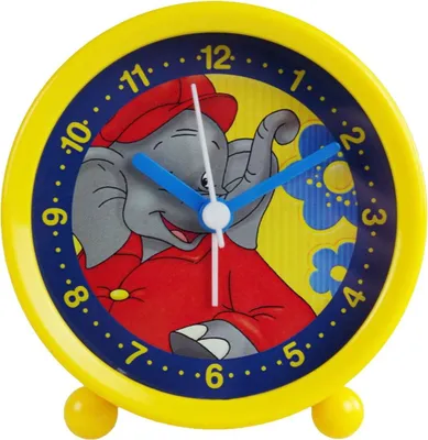 A yellow alarm clock with a cartoon elephant character on the face.