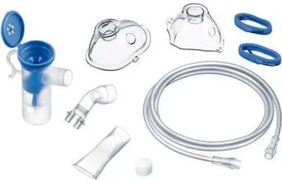 A collection of nebulizer accessories laid out on a white background.