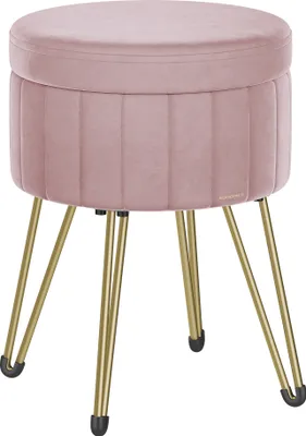 A pink velvet stool with gold legs.
