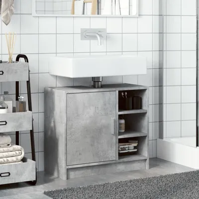 A bathroom vanity with a sink and storage cabinet, along with a rolling cart with toiletries and towels.