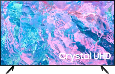 A Samsung Crystal UHD TV displaying abstract colorful imagery.